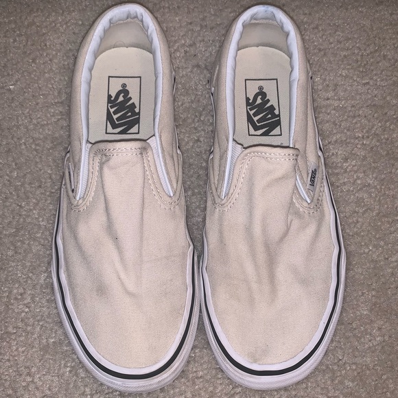 vans slip ons off white